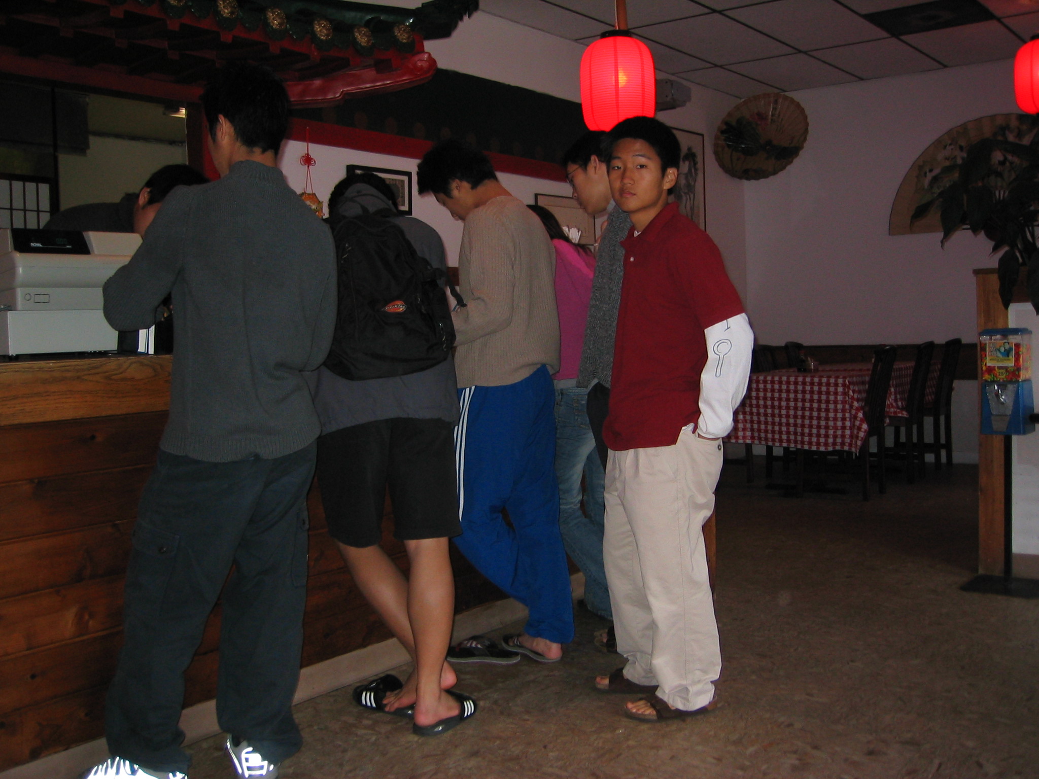 Andrew feeling isolated in a restaurant
